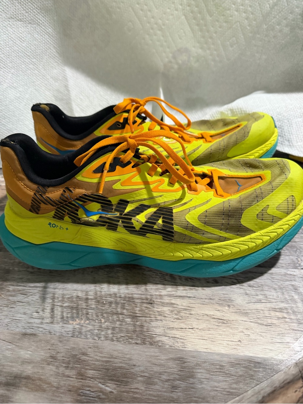 Hoka men's size 10 Yellow & Teal Athletic Sneakers with Orange Accents